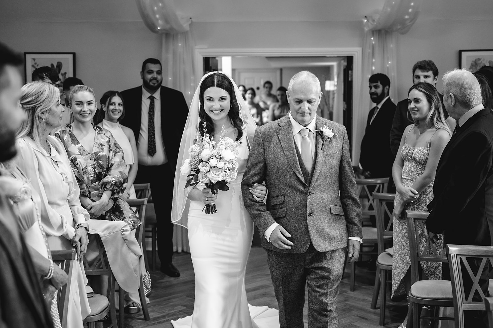 Guests looking on during a wedding ceremony
