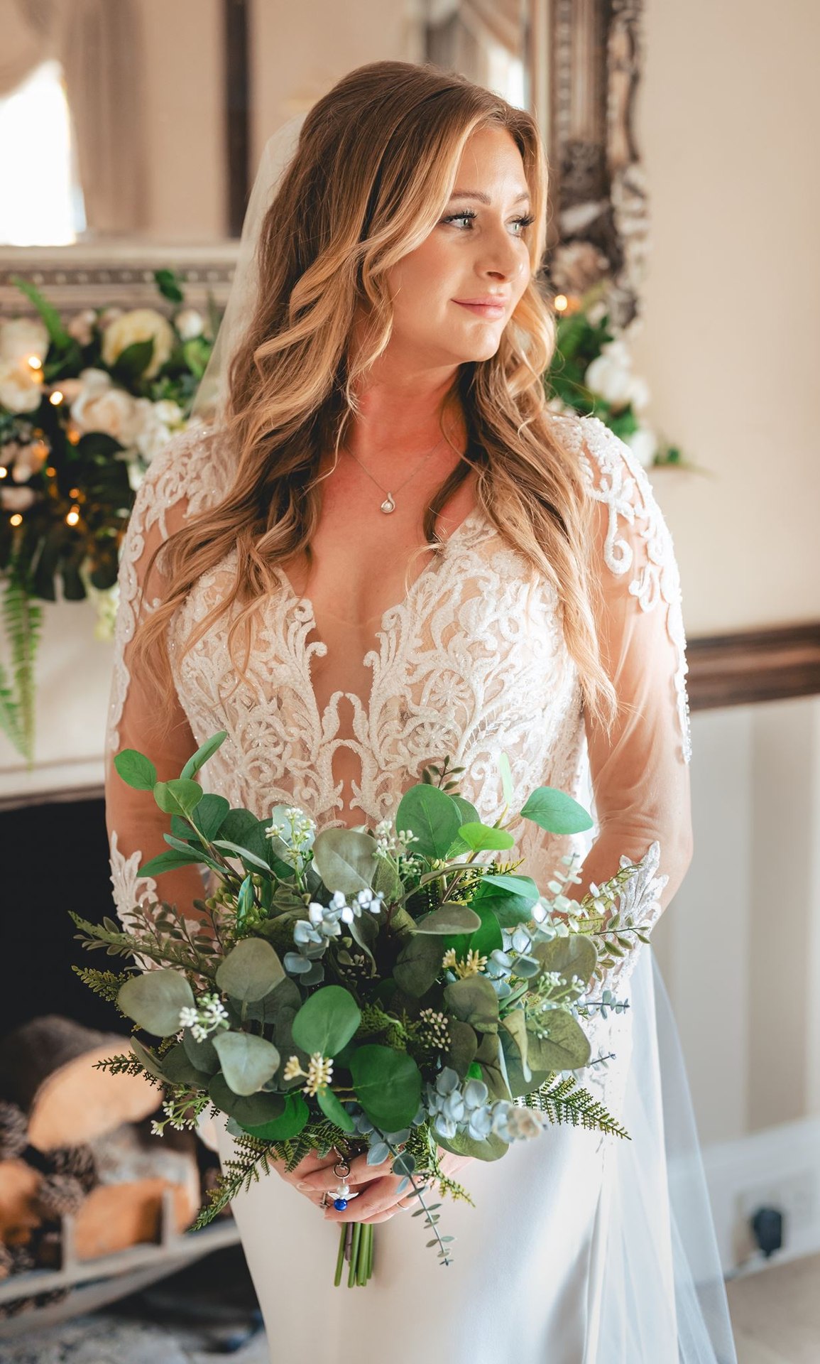 A bride holding her bouquet in the morning light